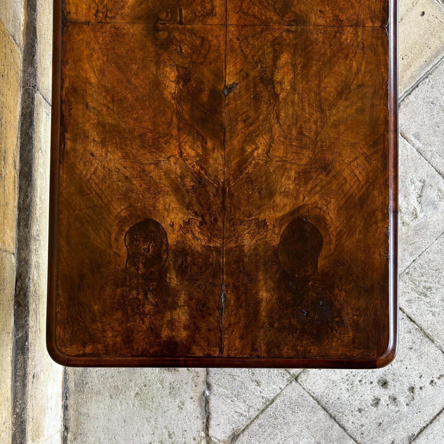 A VICTORIAN WALNUT AND ROSEWOOD LIBRARY TABLE