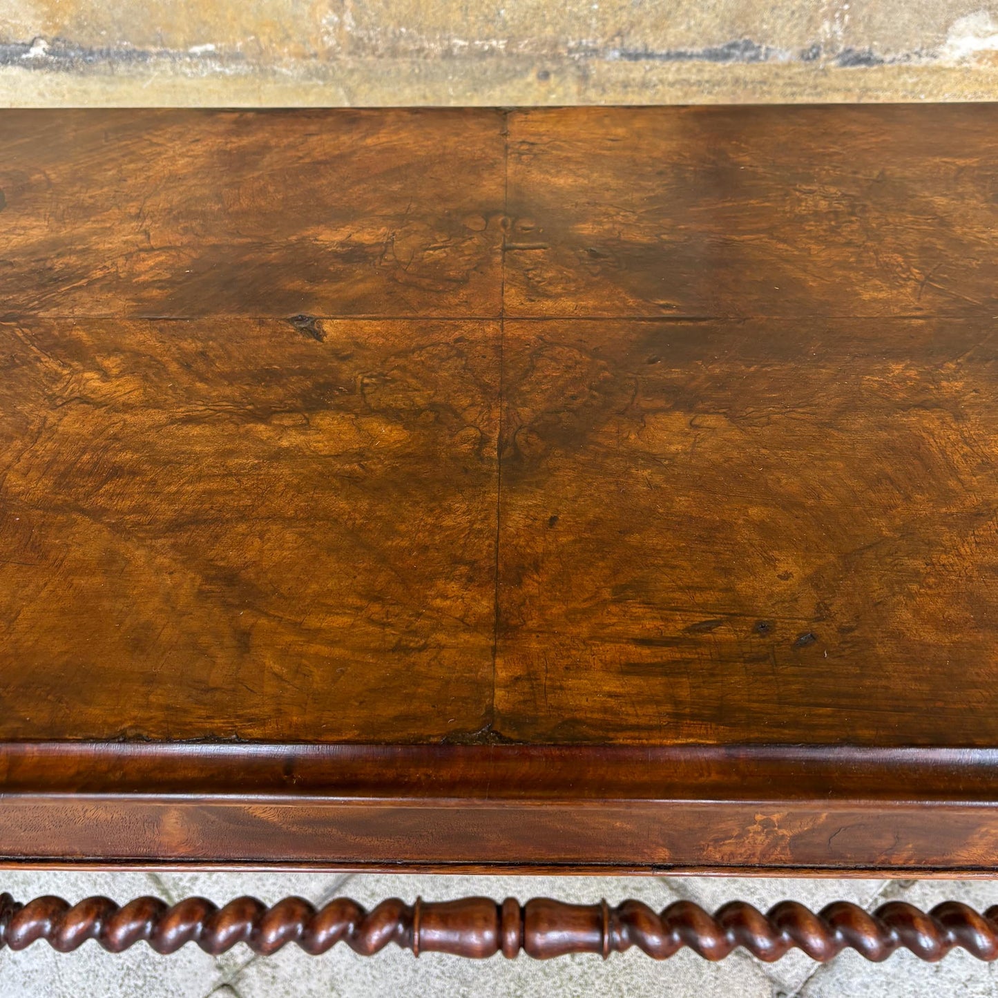 A VICTORIAN WALNUT AND ROSEWOOD LIBRARY TABLE